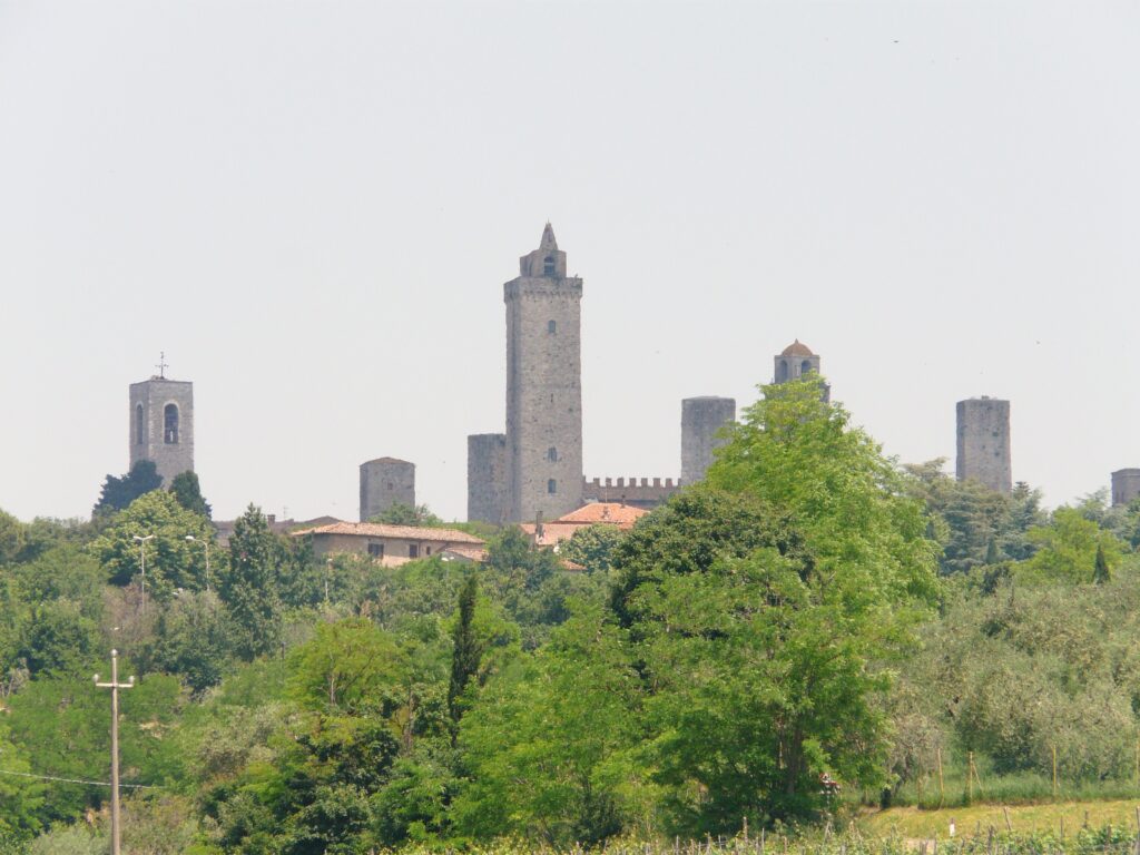 san-gimignano-towers-panorama San Gimignano skyline with medieval towers in Tuscany